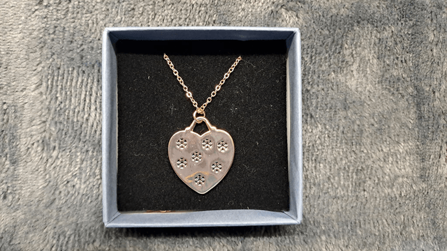 Rose Gold Coloured Reindeer and Snowflakes Heart Shaped Pendant Necklace.