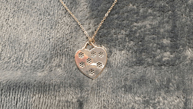 Rose Gold Coloured Reindeer and Snowflakes Heart Shaped Pendant Necklace.